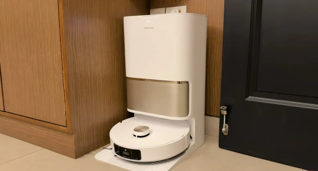 Dreame L50s Pro Ultra robot vacuum parked in its self-cleaning dock inside a modern home.